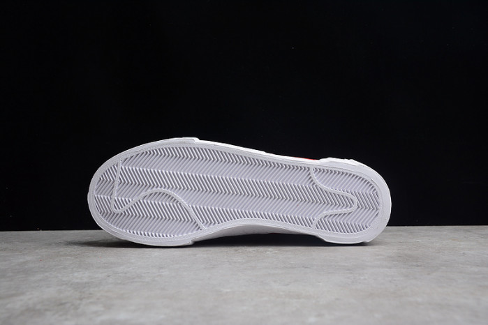 KAWS x sacai x Blazer Low 